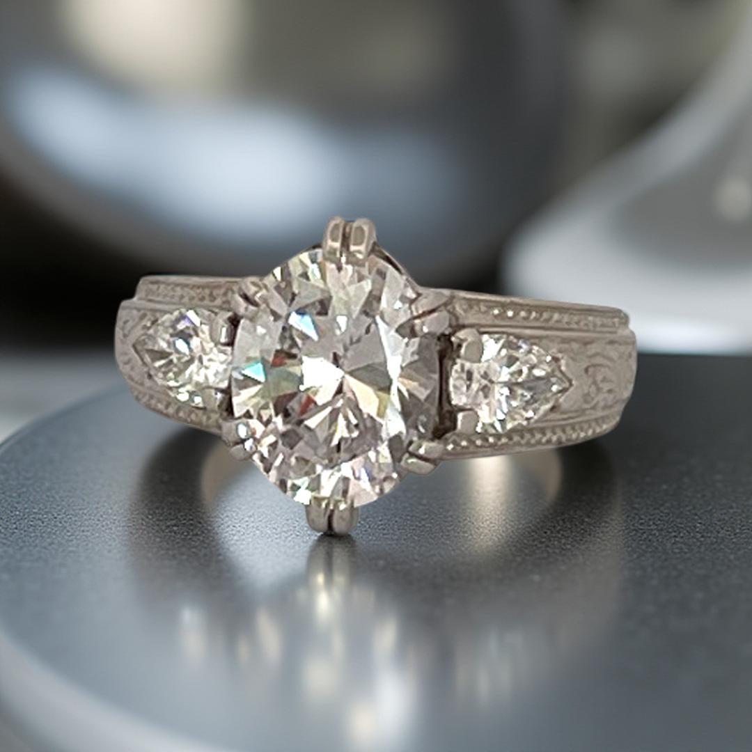 Cubic Zirconium Oval Center in Platinum Natural Diamond Mounting